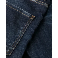 Jeans med bleget effekt og frontknap