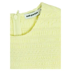 Kjole med åbenvævet kant