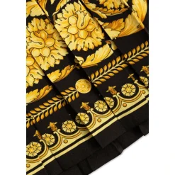 Kjole med plisseret nederdel