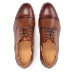 Læder halvsko med rosetdekoration på hælen