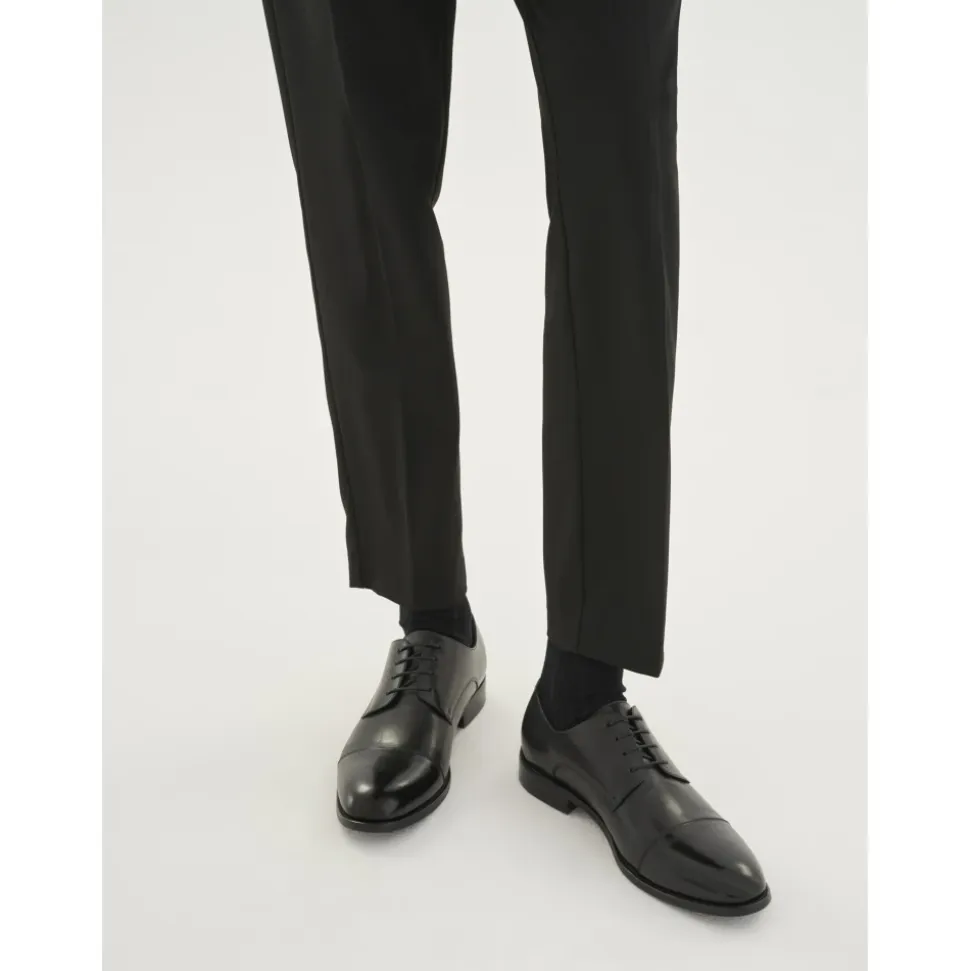 Sorte derby sko til mænd.Dette produkt er stort i størrelsen.